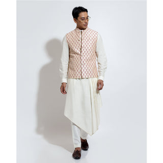 Sleeveless bandi with linear motif couching embroidery layered over assymetric hem kurta