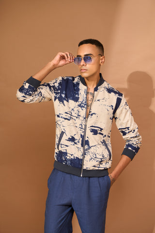 Bomber in beige/ink crackle print with contrast rib at collar and hem